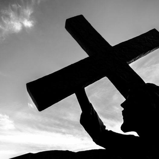 Bronze statue of jesus carrying his cross on the 2022 11 01 01 17 56 utc r